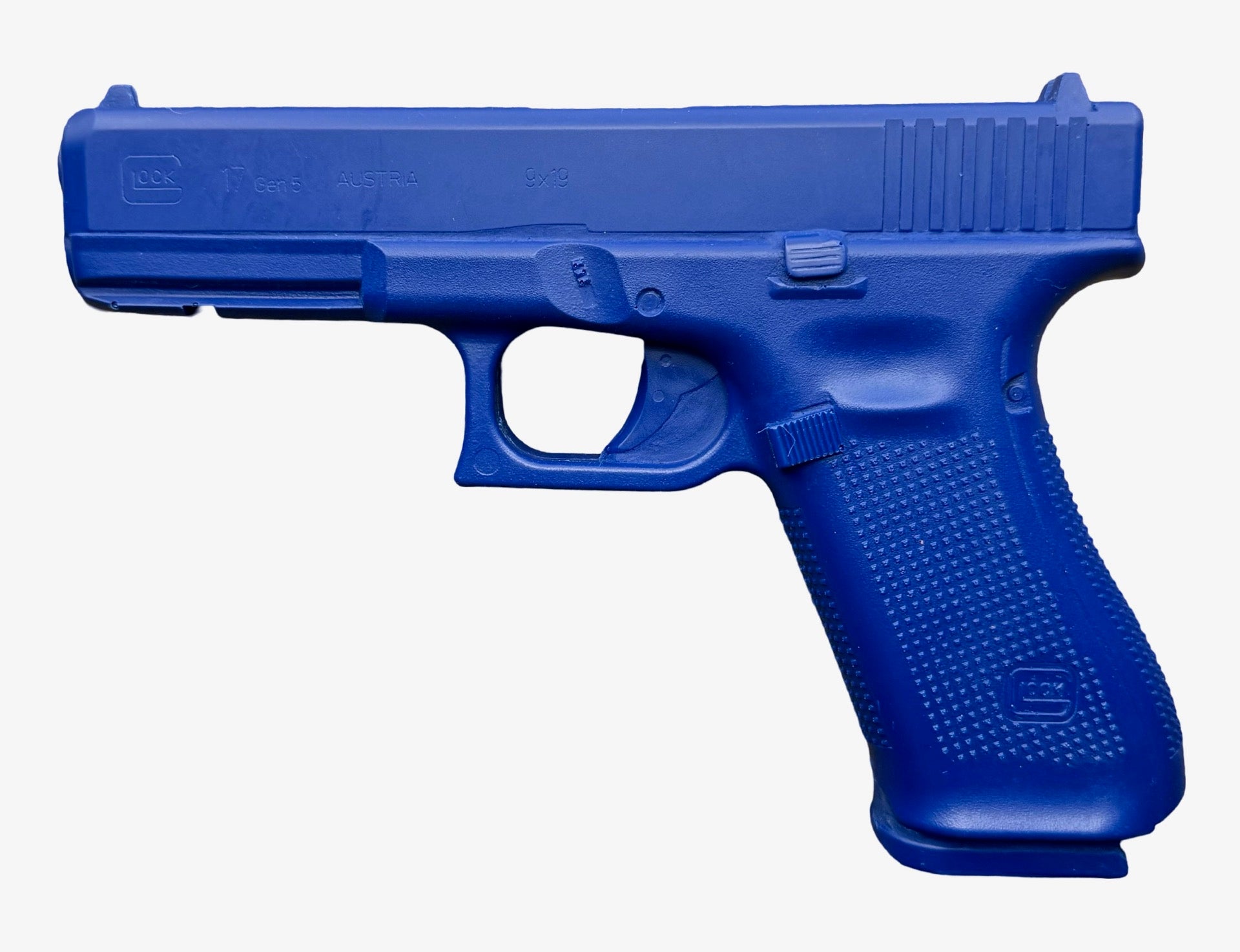 Blue Training Guns By Rings Glock 17 Generation 5 Firearm Simulator FSG17G5. Blue gun-shaped object on a white background