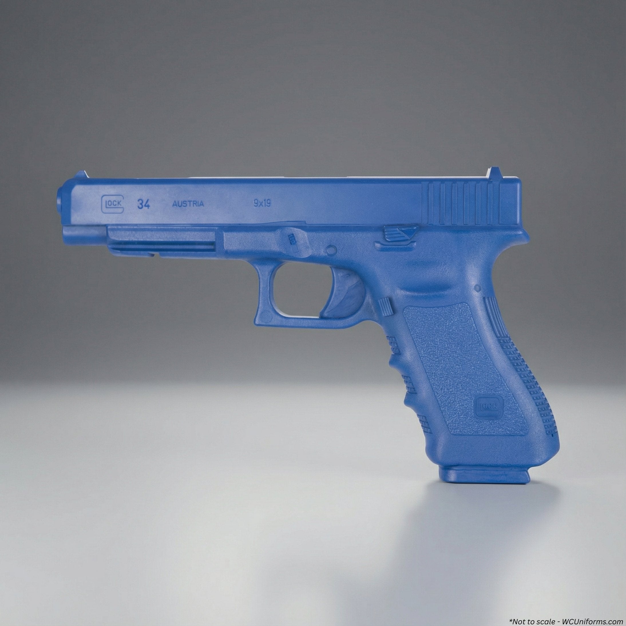 Blue Training Guns By Rings Glock 34 | FSG34 on a gray studio background