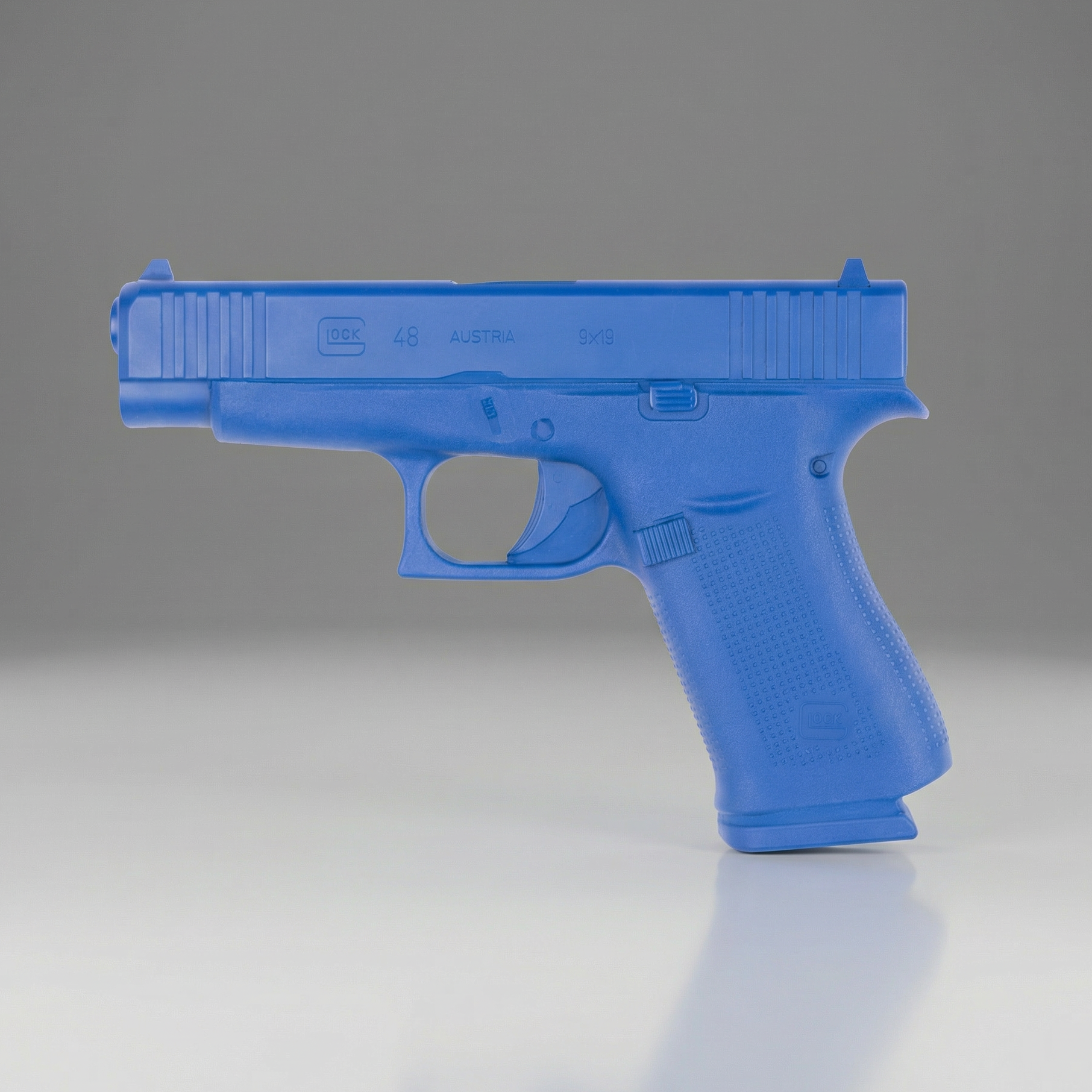 Blue Blue Training Guns By Rings Glock 48 Blue Training Gun FSG48 on a gray background