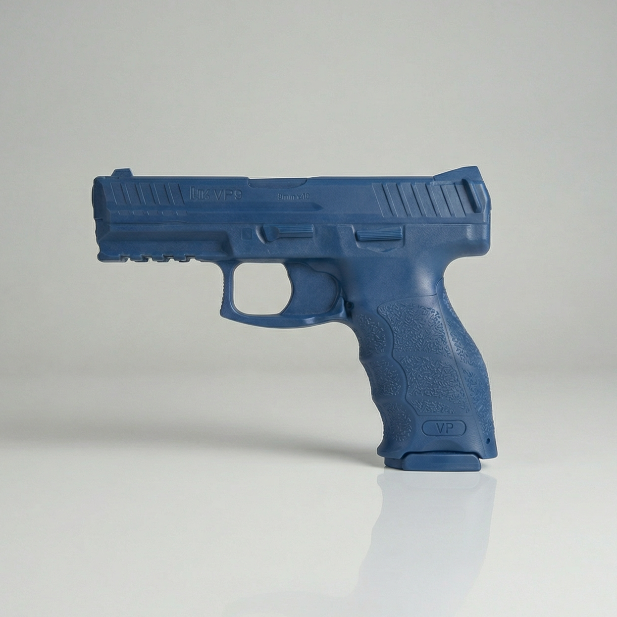 Blue Training Guns By Rings Heckler & Koch VP9 | FSVP9 on a gray background