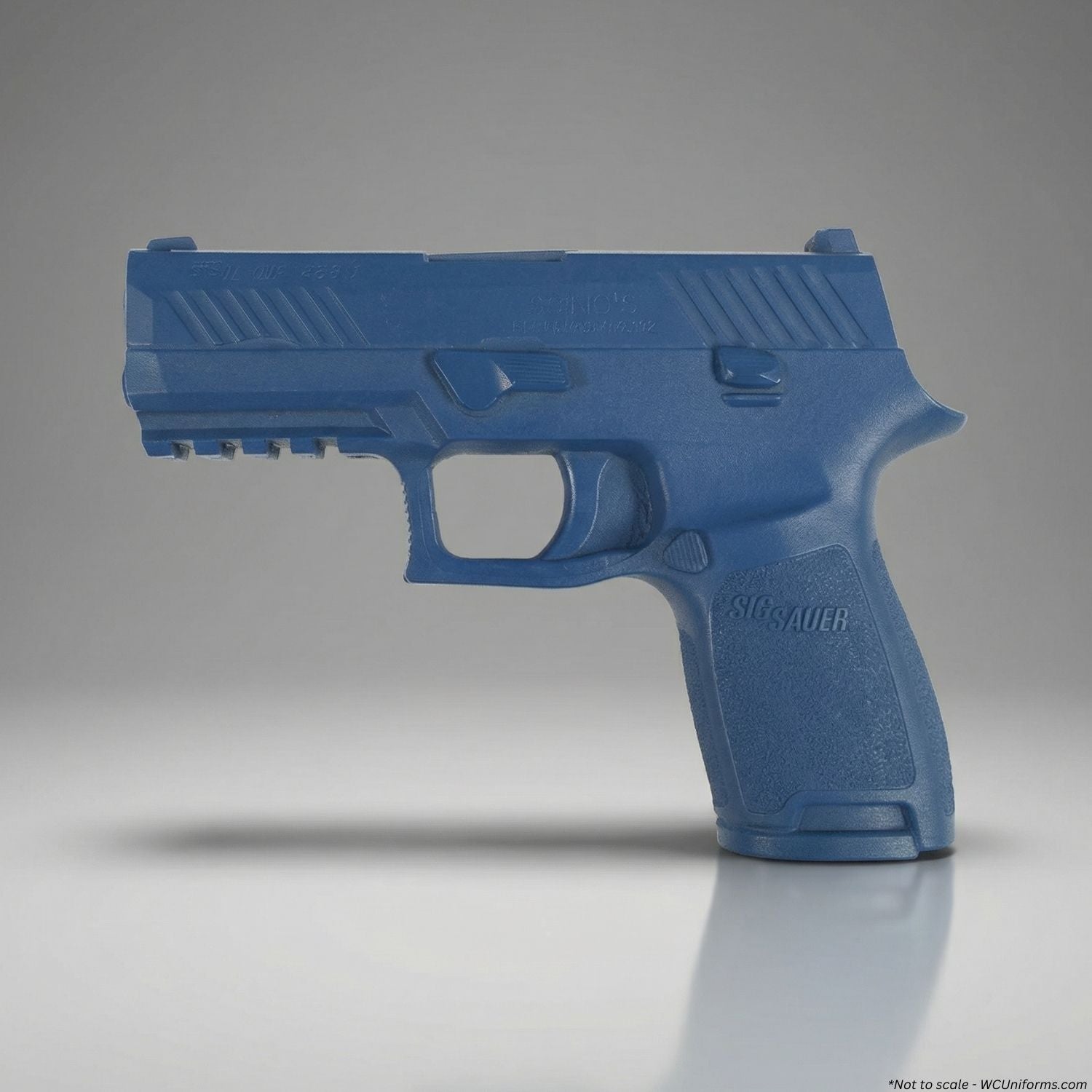 Blue gun-shaped object on a gray background