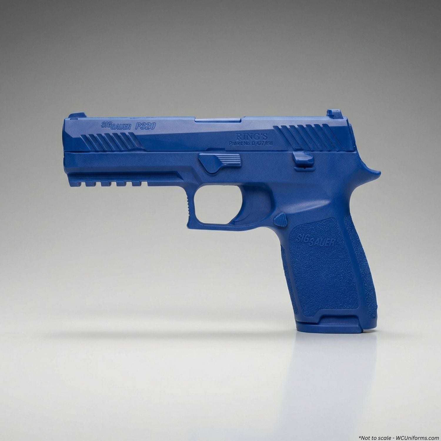 Blue gun-shaped object on a gray background
