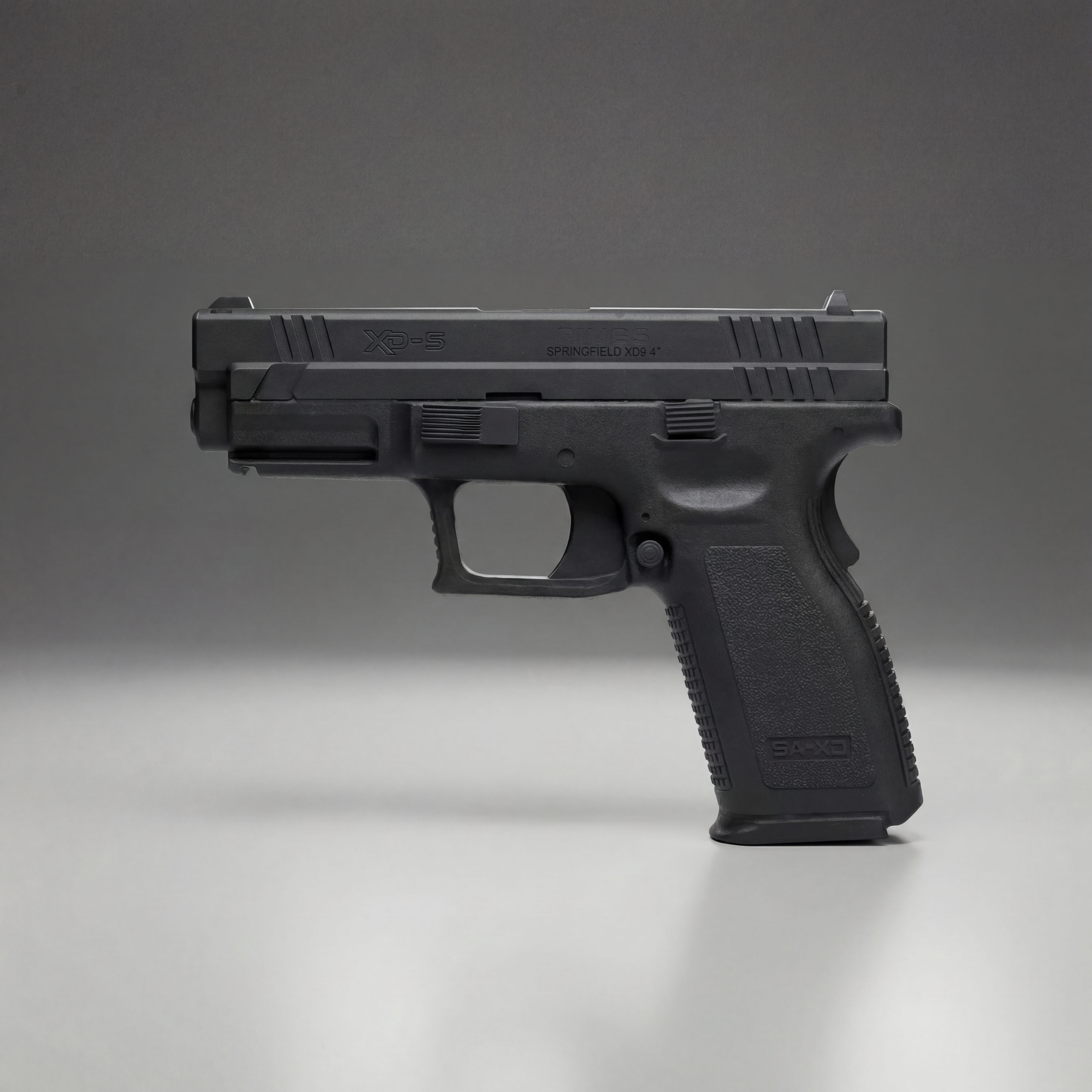 Black Blue Training Guns By Rings Springfield XD9 | FSXD9101 on a gray background