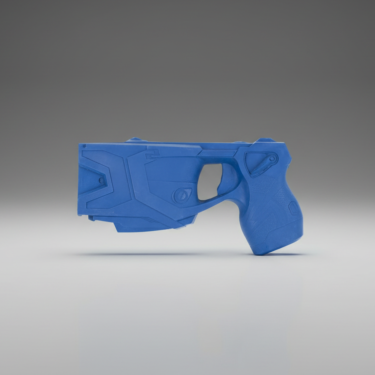Blue toy gun on a gray background