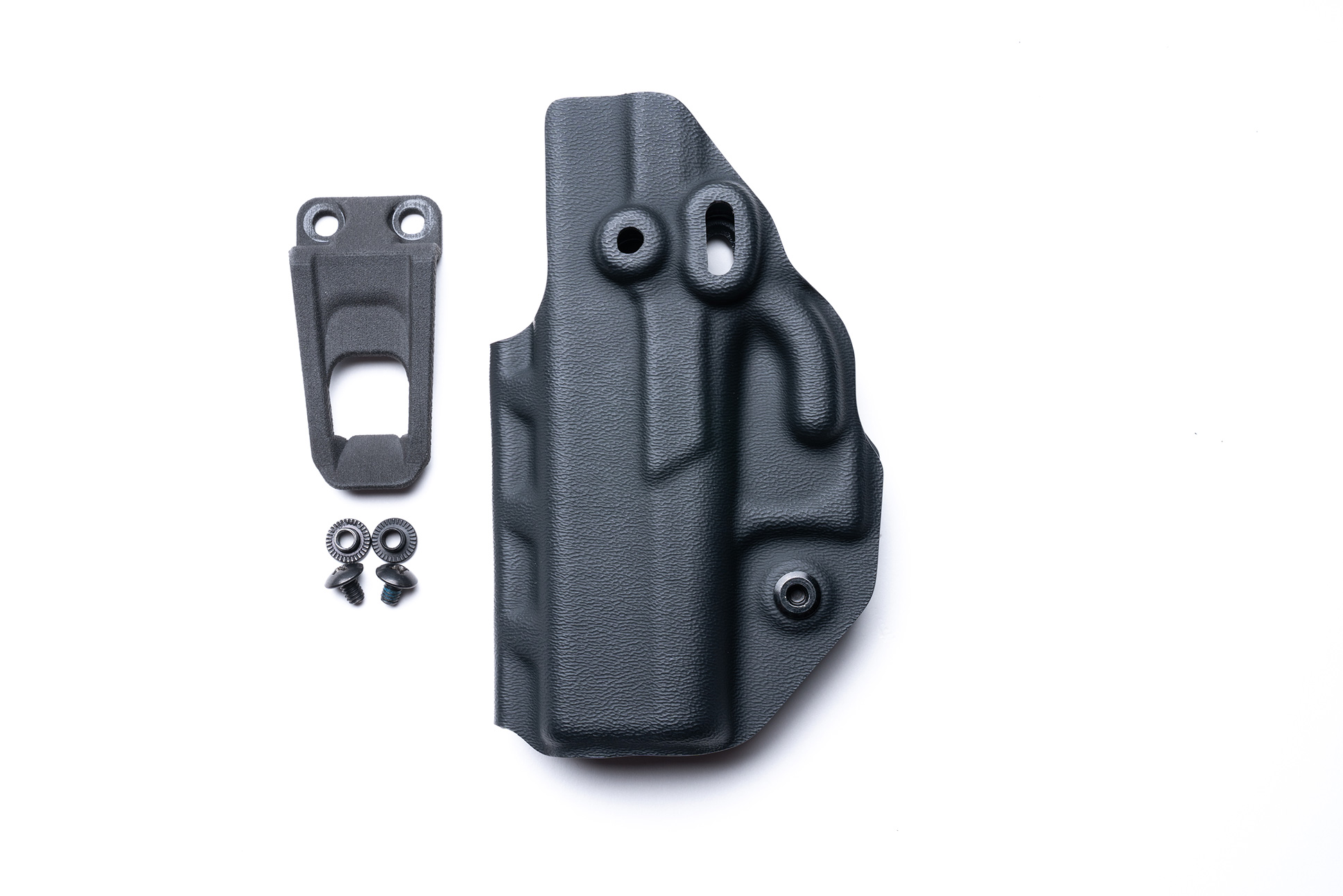 CRUCIAL CONCEALMENT Covert IWB holster with accessories, featuring a durable KYDEX design and adjustable carry options.