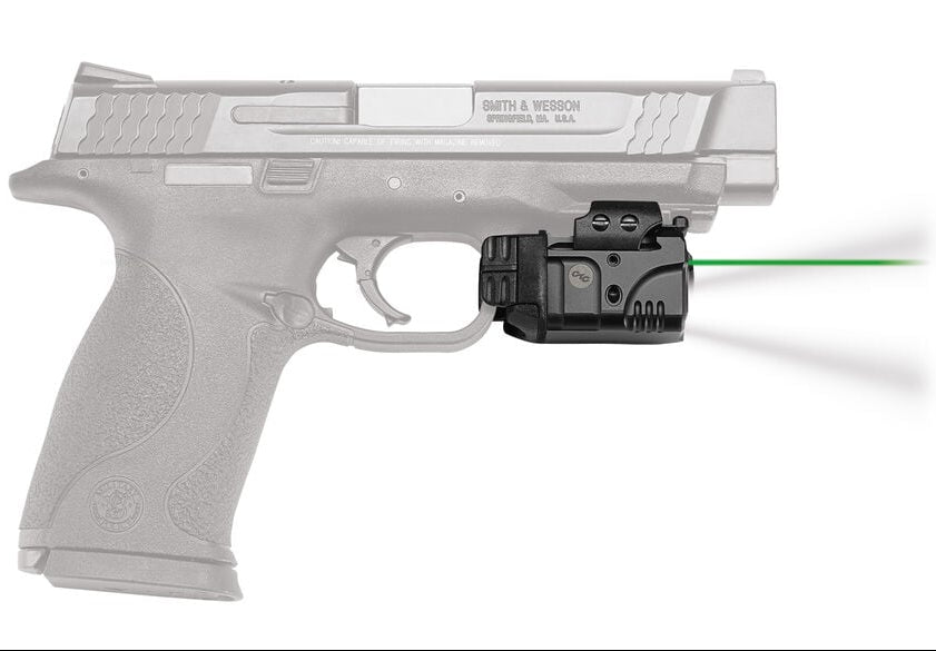 Pistol with a laser sight on a white background