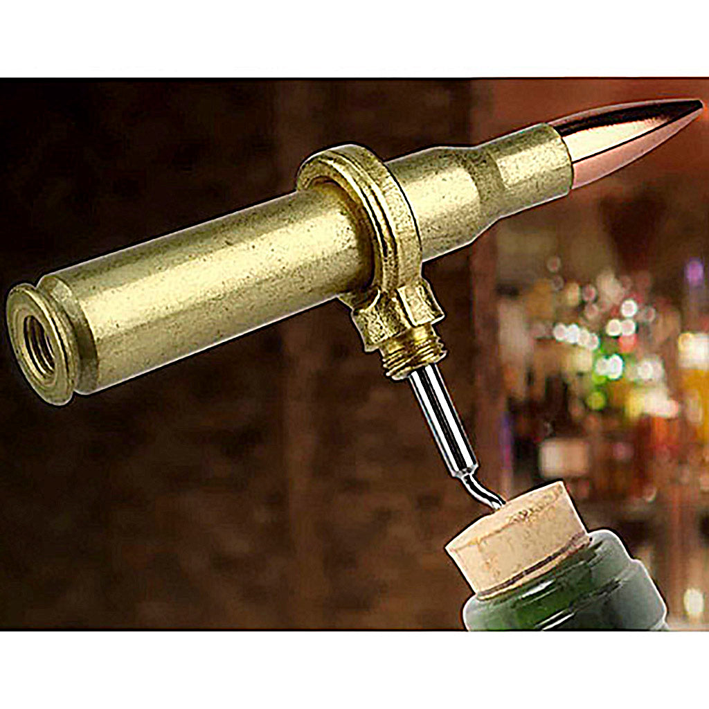 Bottle opener designed like a bullet with brass casing, being used on a bottle.