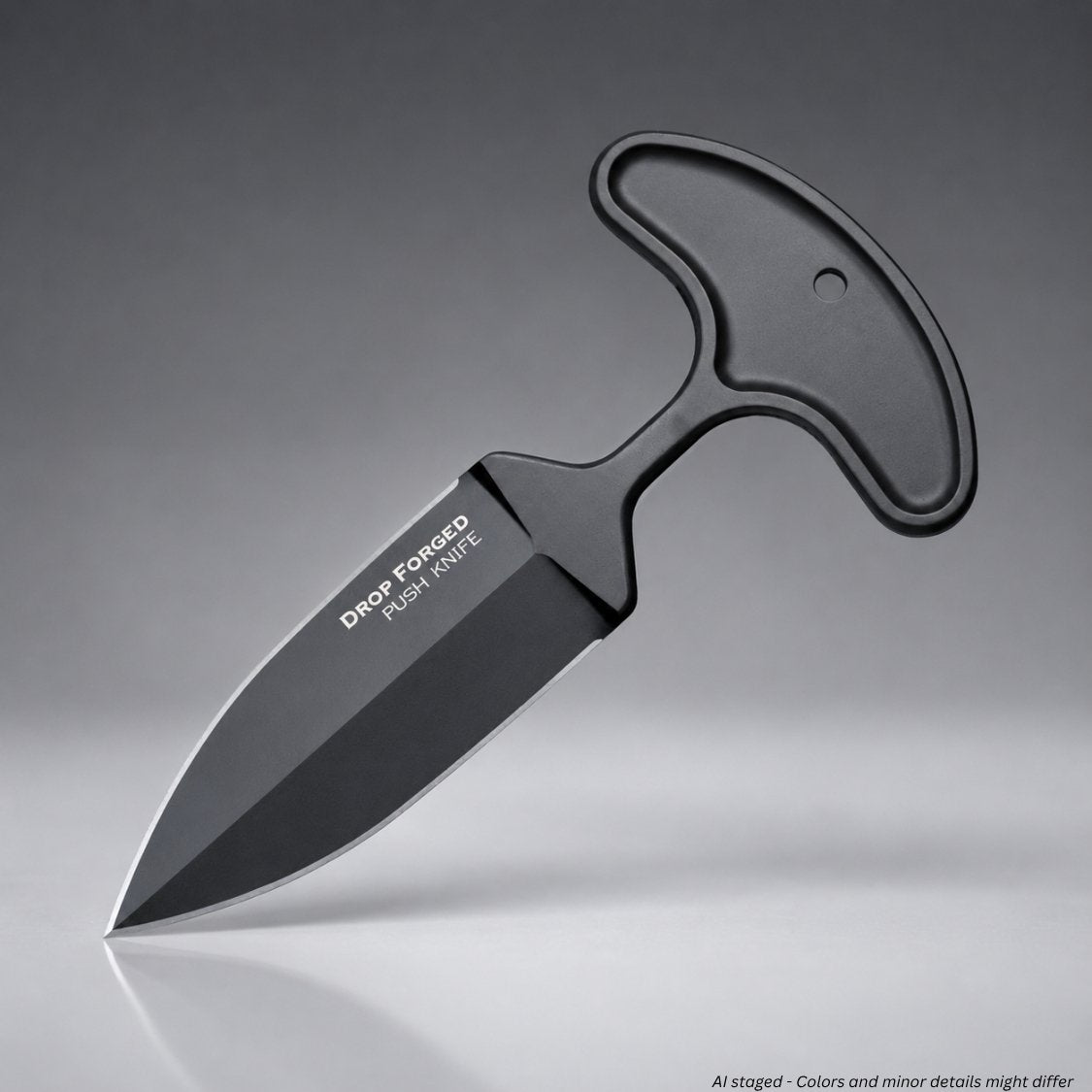 Black push knife with 'Drop Forged' branding on a gray background