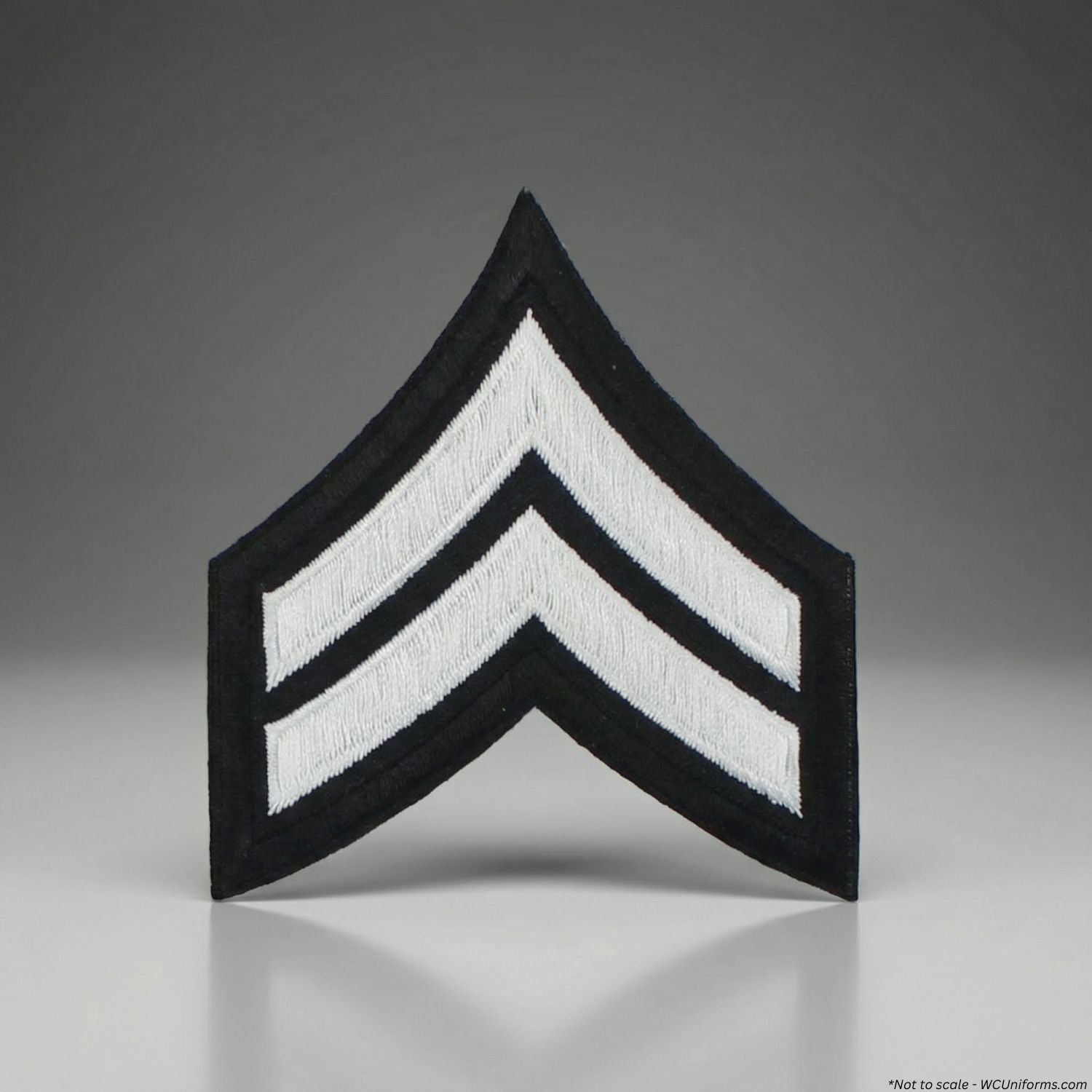 Black and white military rank insignia on a gray background