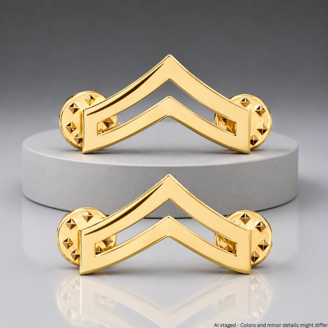 Corporal Chevron Rank Collar Pins - Gold-plated pair displayed on pedestal