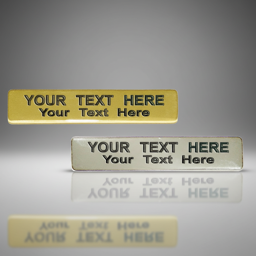 Two customizable name plates, one gold and one silver, on a gray background.