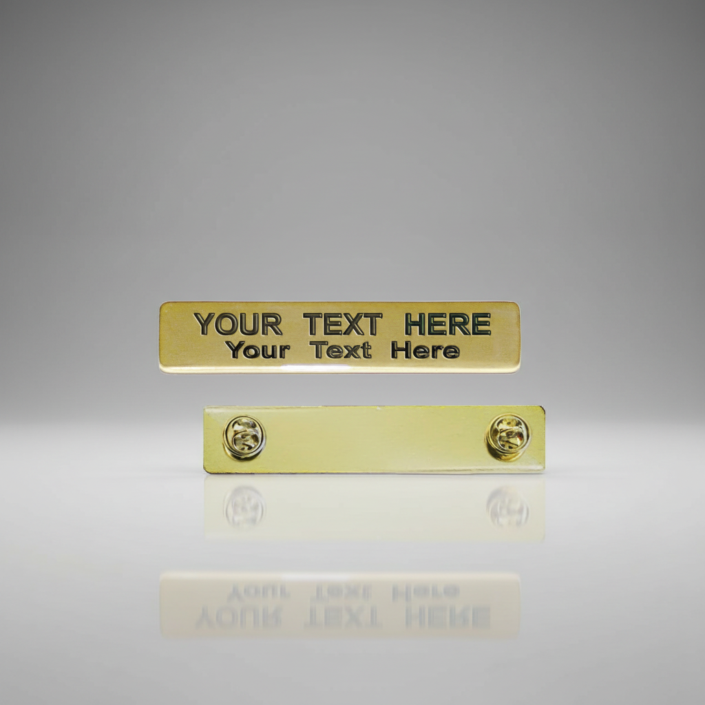 Gold name plates with customizable text on a gray background