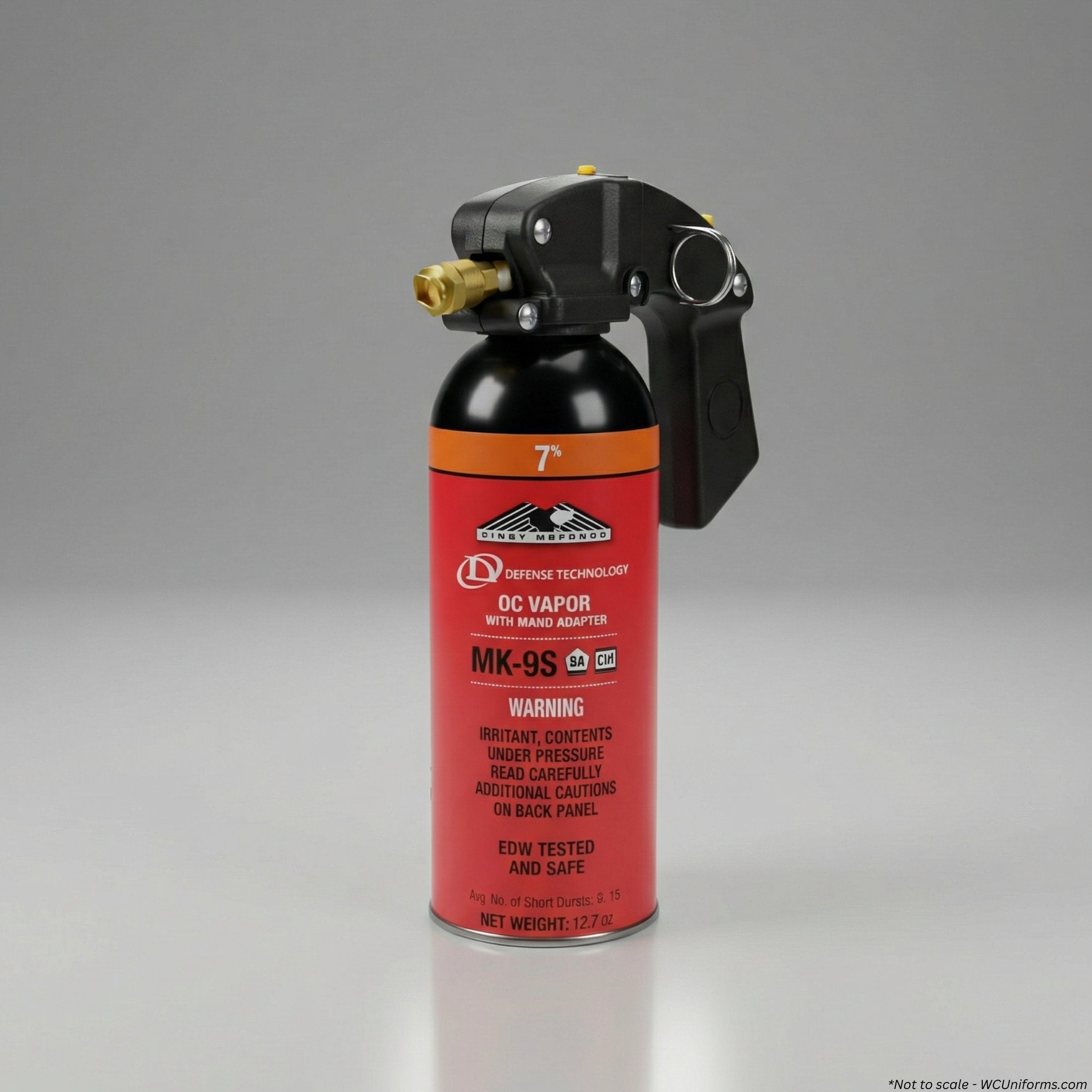 Red fire extinguisher with black nozzle on a gray background