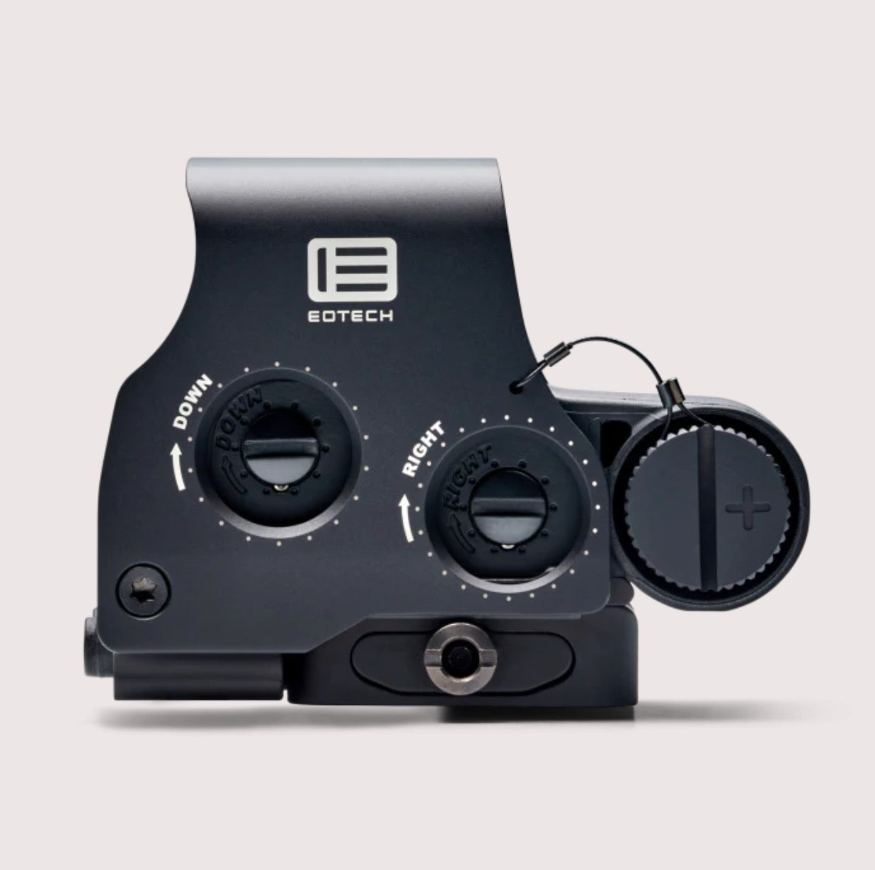 Black Eotech device with control knobs on a light gray background