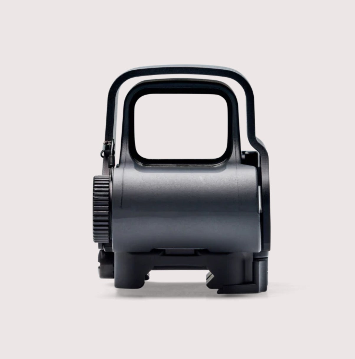 Black tactical sight on a light gray background