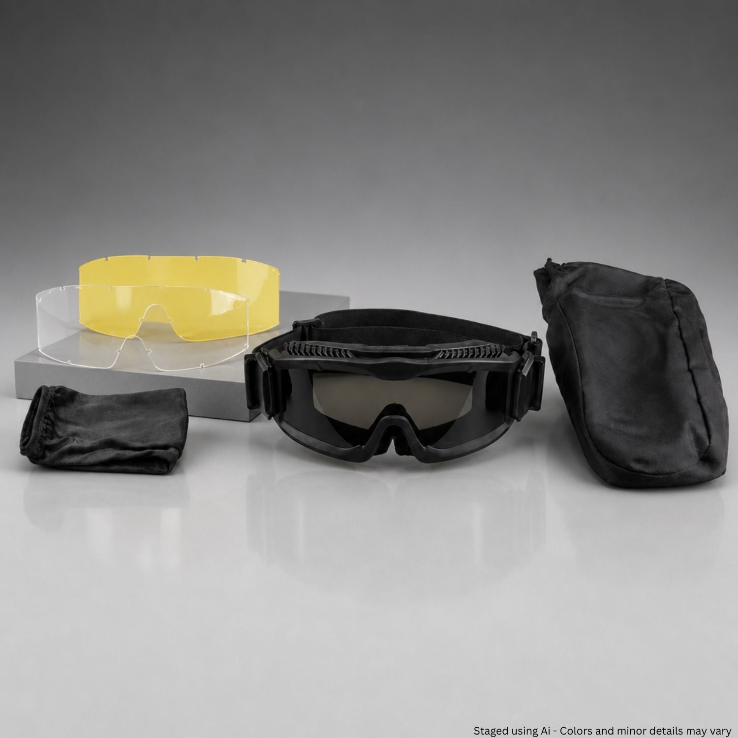 Black goggles with yellow lens and black carrying case on a gray background