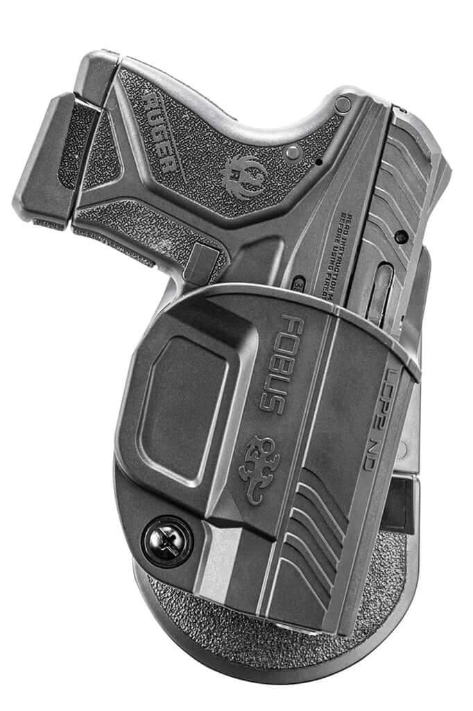 Fobus Evolution Paddle R holster featuring adjustable retention screw and low-profile design for enhanced concealability.