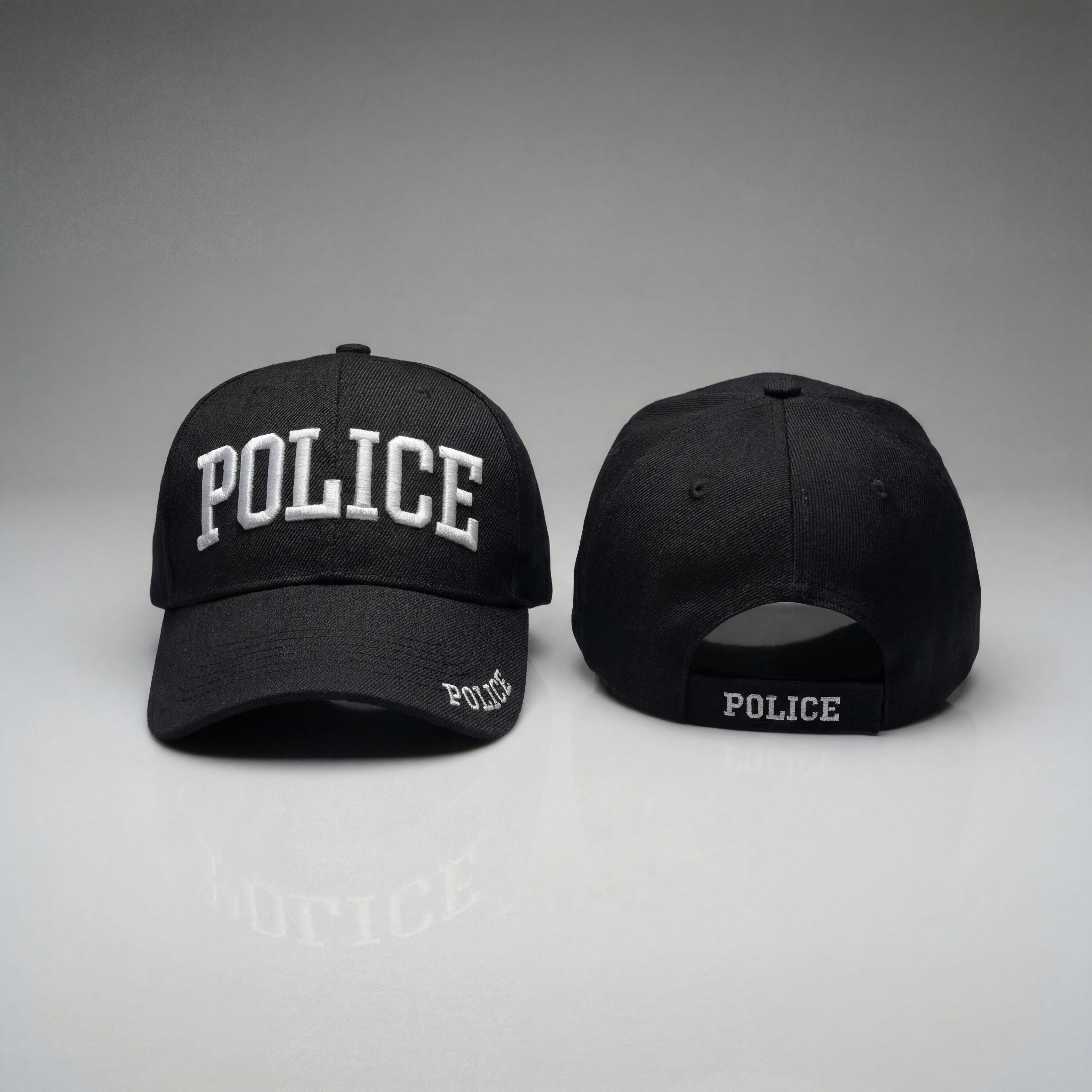 Two black police caps with 'POLICE' embroidered on a gray background
