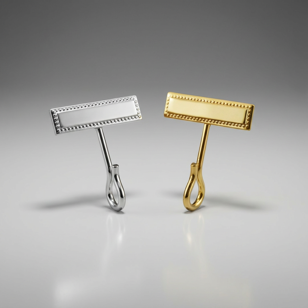 Gold and silver Hero's Pride Uniform Whistle Hooks 4015 on a gray background