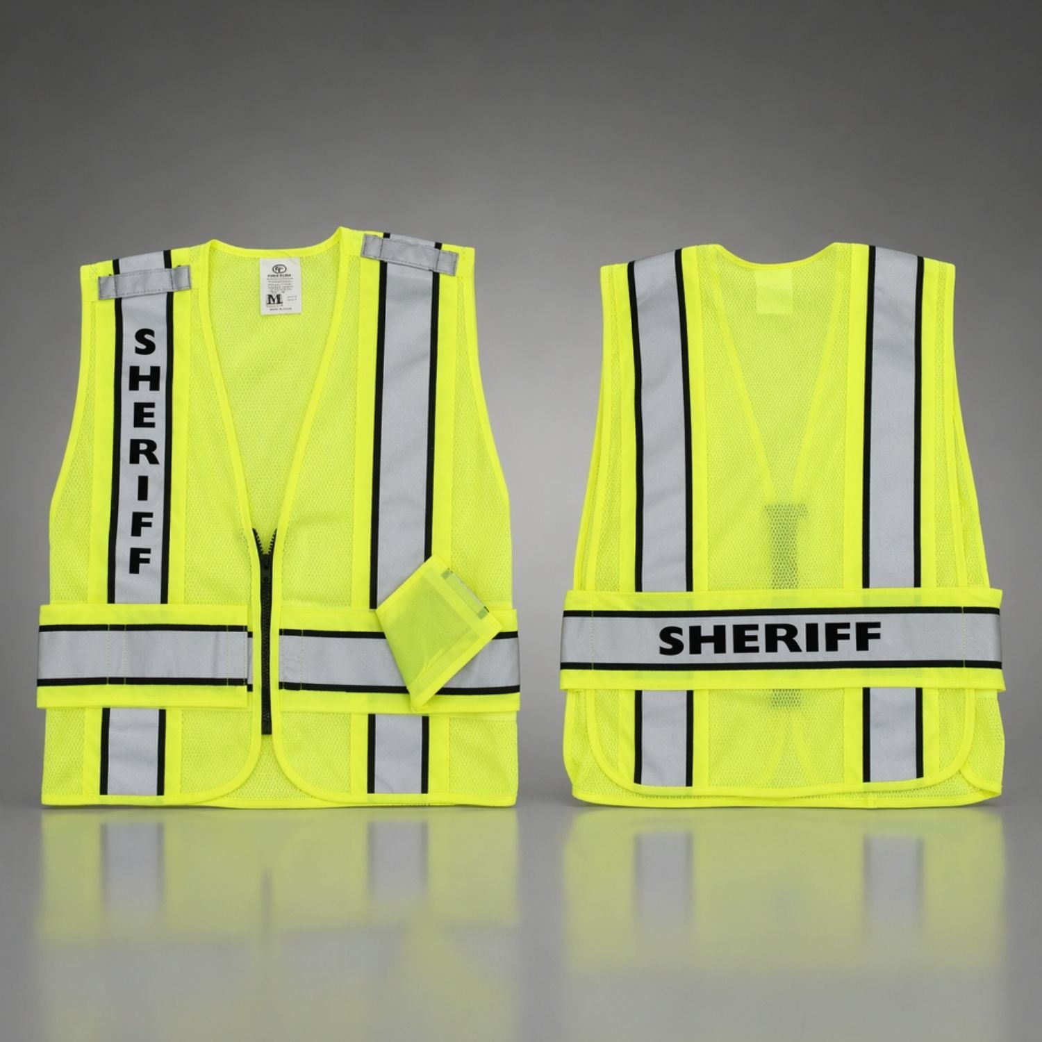 Yellow safety vest with 'SHERIFF' text on a gray background