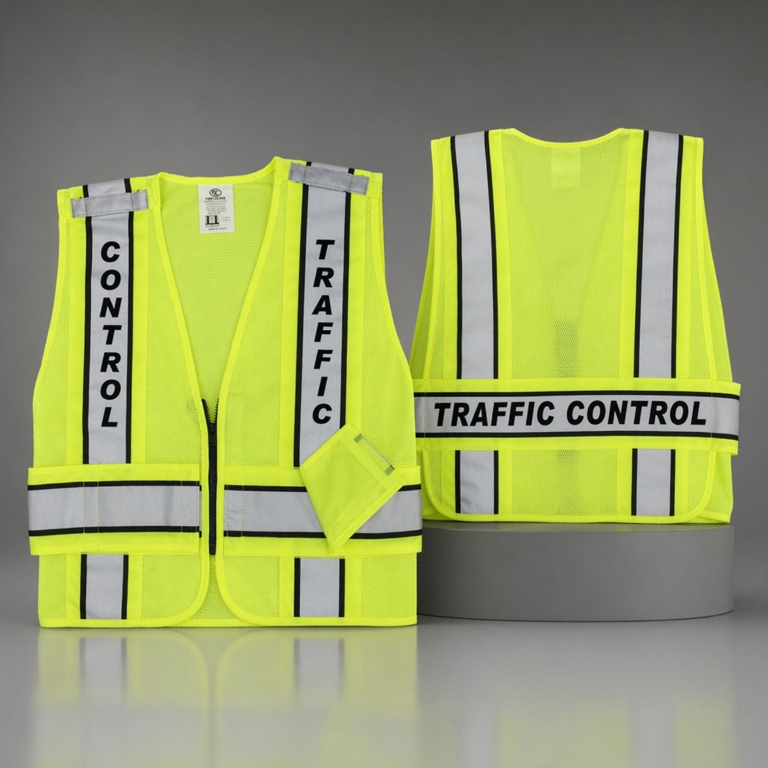 Yellow safety vest with 'Traffic Control' text on a gray background