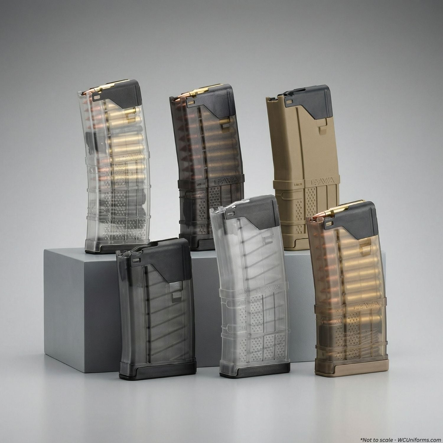 Set of six rifle magazines on a gray background