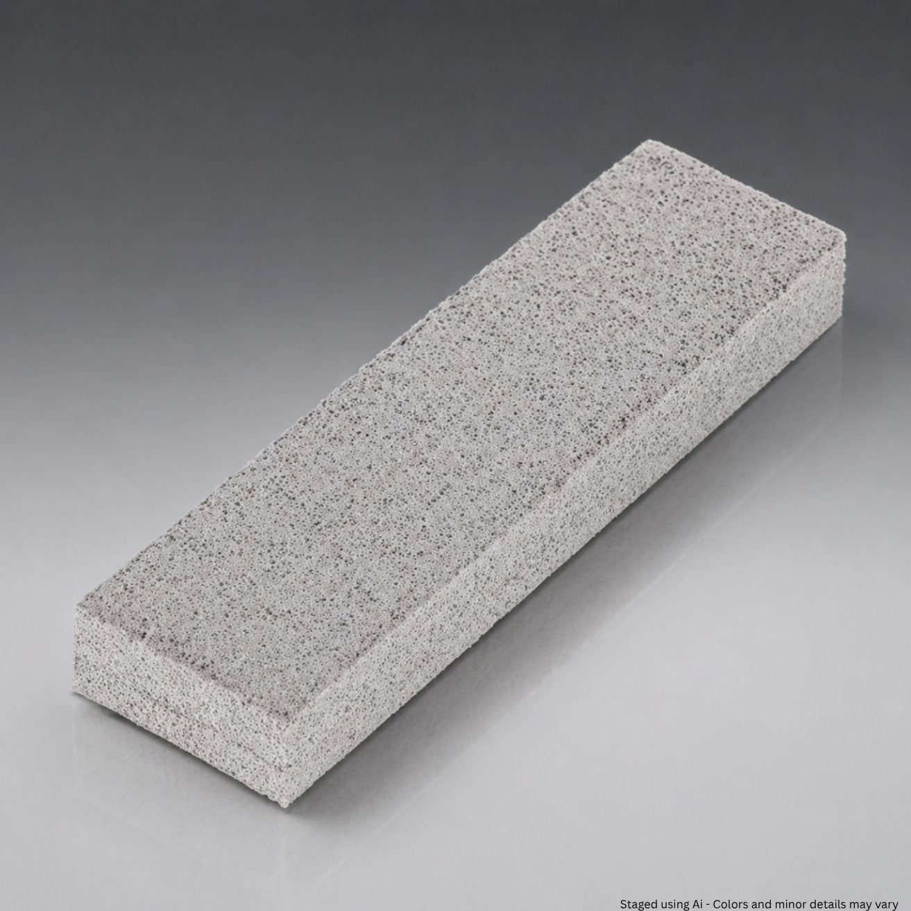 Rectangular ceramic sharpening block on a gray background