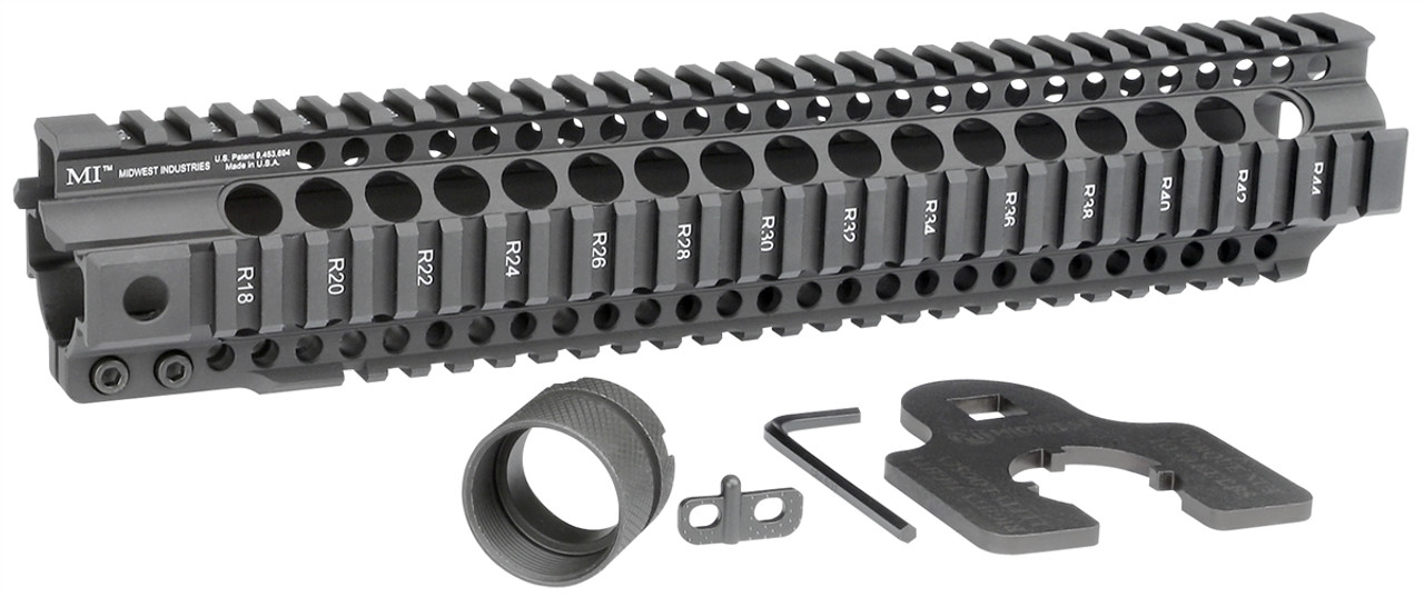 Midwest Industries Combat Rail T-Series handguard with barrel nut and wrench, featuring Picatinny rails for accessories.