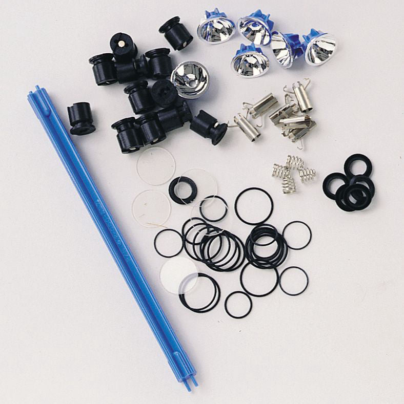 Maglite AA Mini Maglite Repair and Service Kit AM2A064 components arranged on a white background