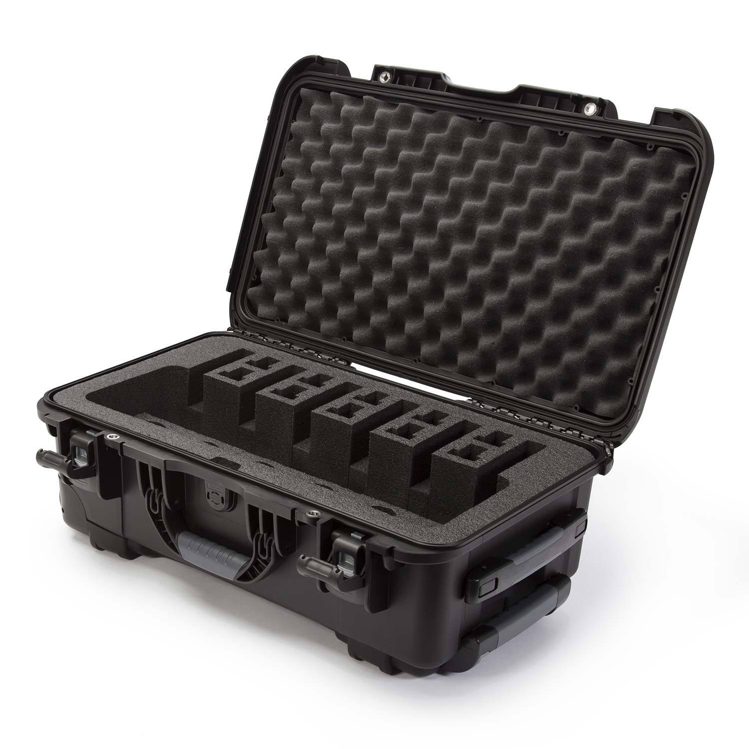 Nanuk 935 waterproof hard case opened, featuring protective foam interior and storage for six items.