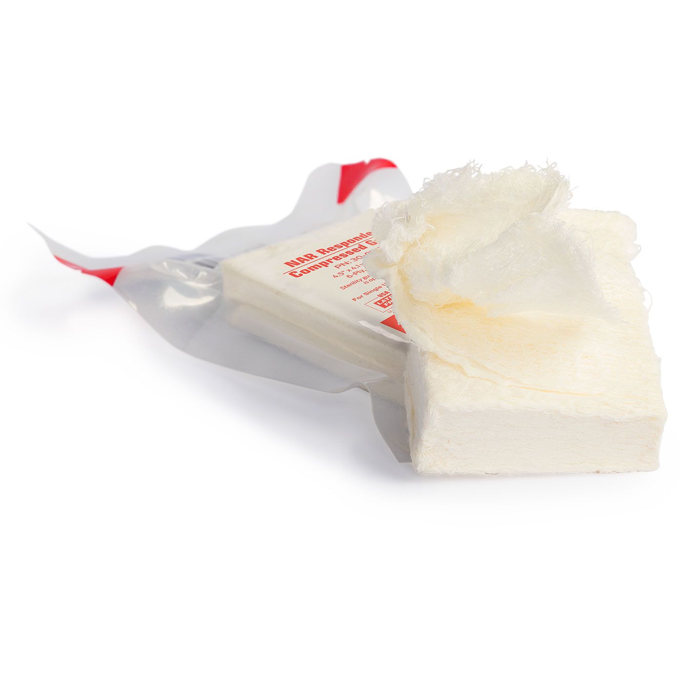 North American Rescue Responder Compressed Gauze 30-0182 in vacuum-sealed packaging, compact sterile cotton wound dressing for emergency trauma care