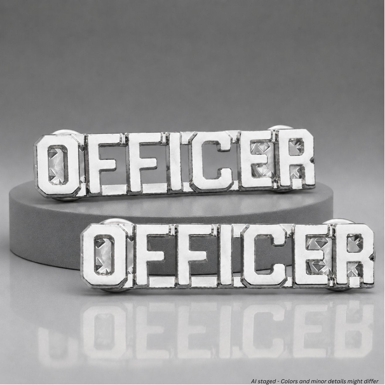 First Class Uniforms nickel-plated silver Officer Collar Pins pair IN55 showing bright chrome finish and open block lettering