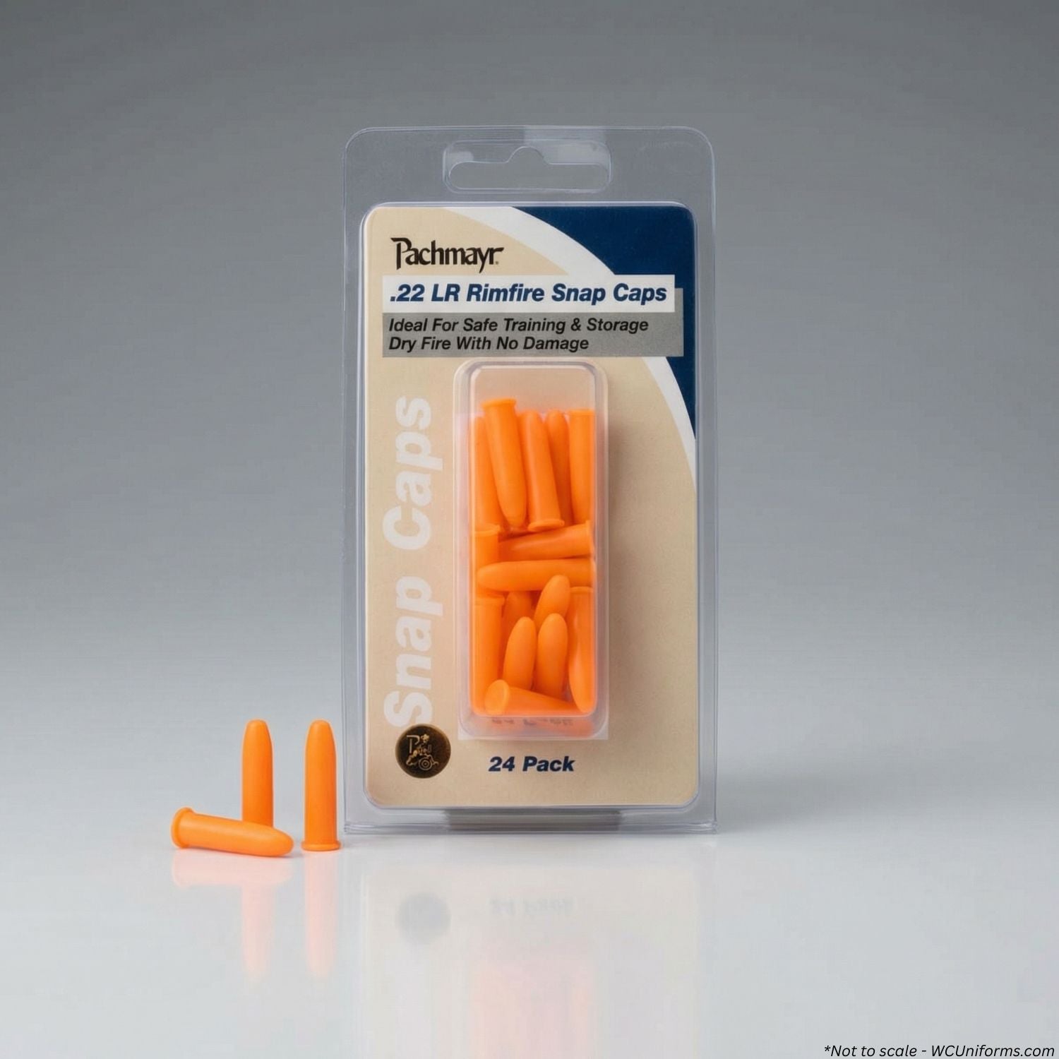Pack of orange snap caps with packaging on a gray background