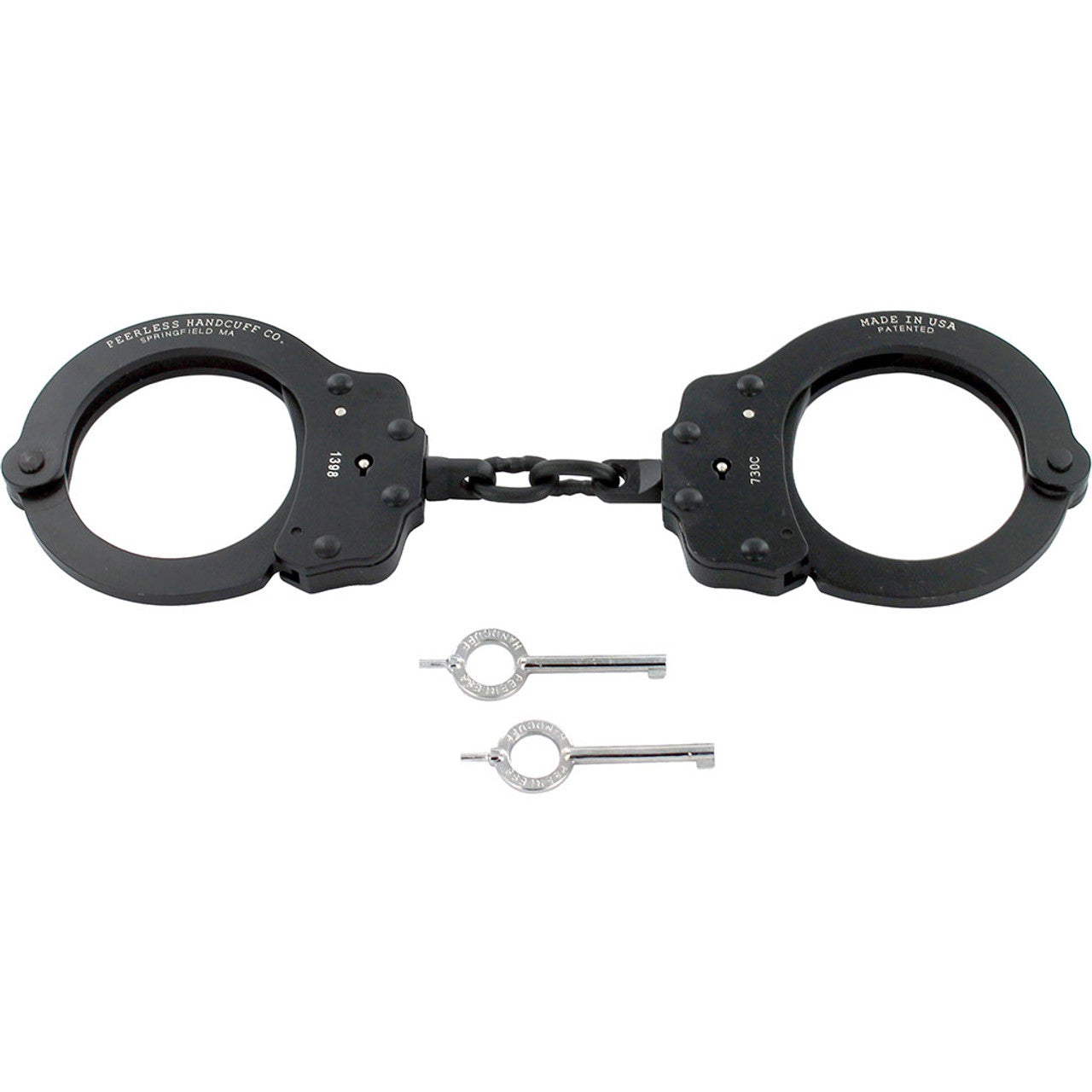 Black handcuffs with two keys on a white background
