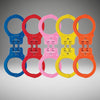 Set of colorful handcuffs on a gray background