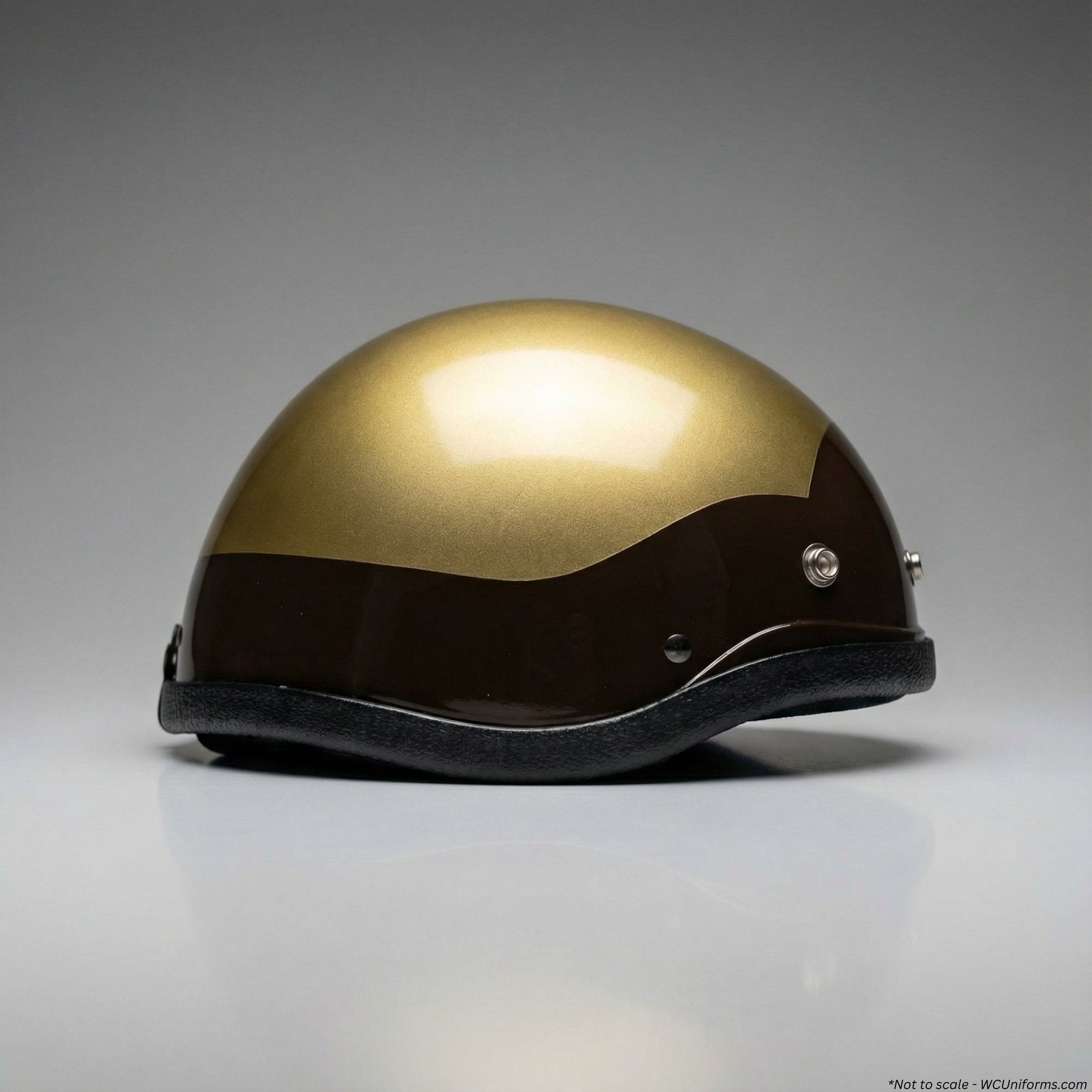 Gold and black helmet on a reflective surface with a gray background