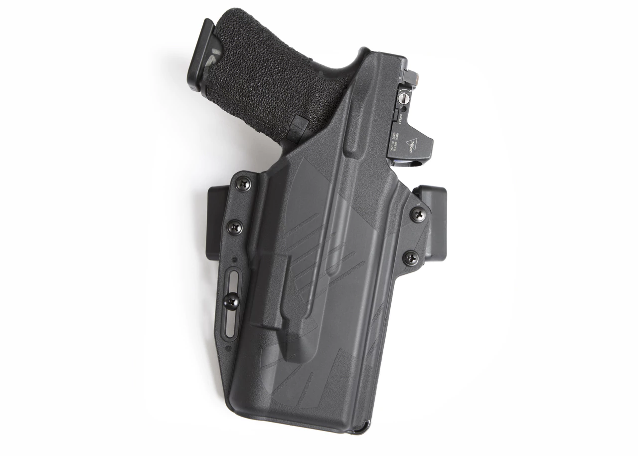 Raven Concealment Perun light-compatible OWB holster showcasing sleek design and modular features for optimal concealment.