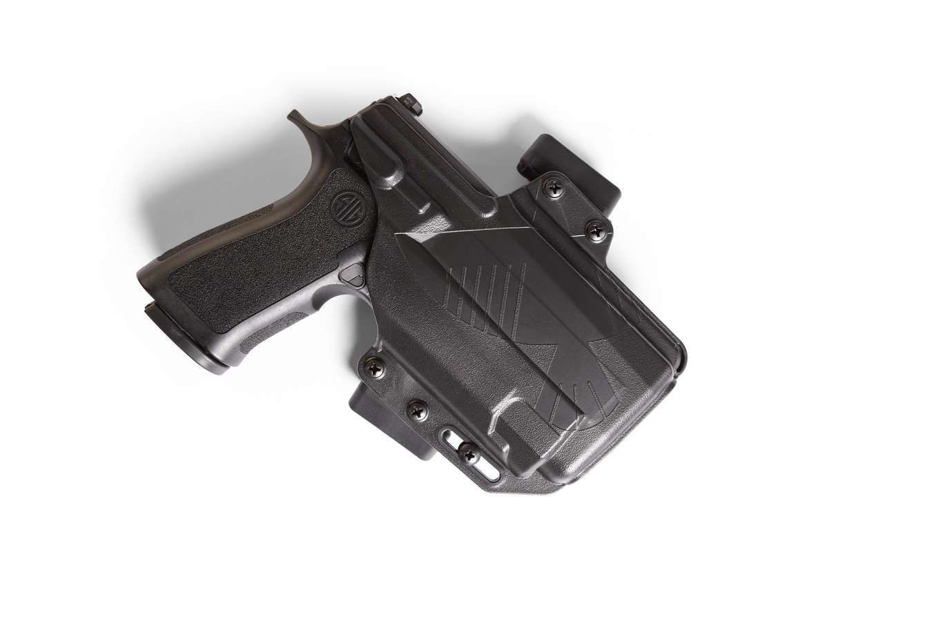 Raven Concealment Perun light-compatible OWB holster with firearm, showcasing its sleek design and modular features.