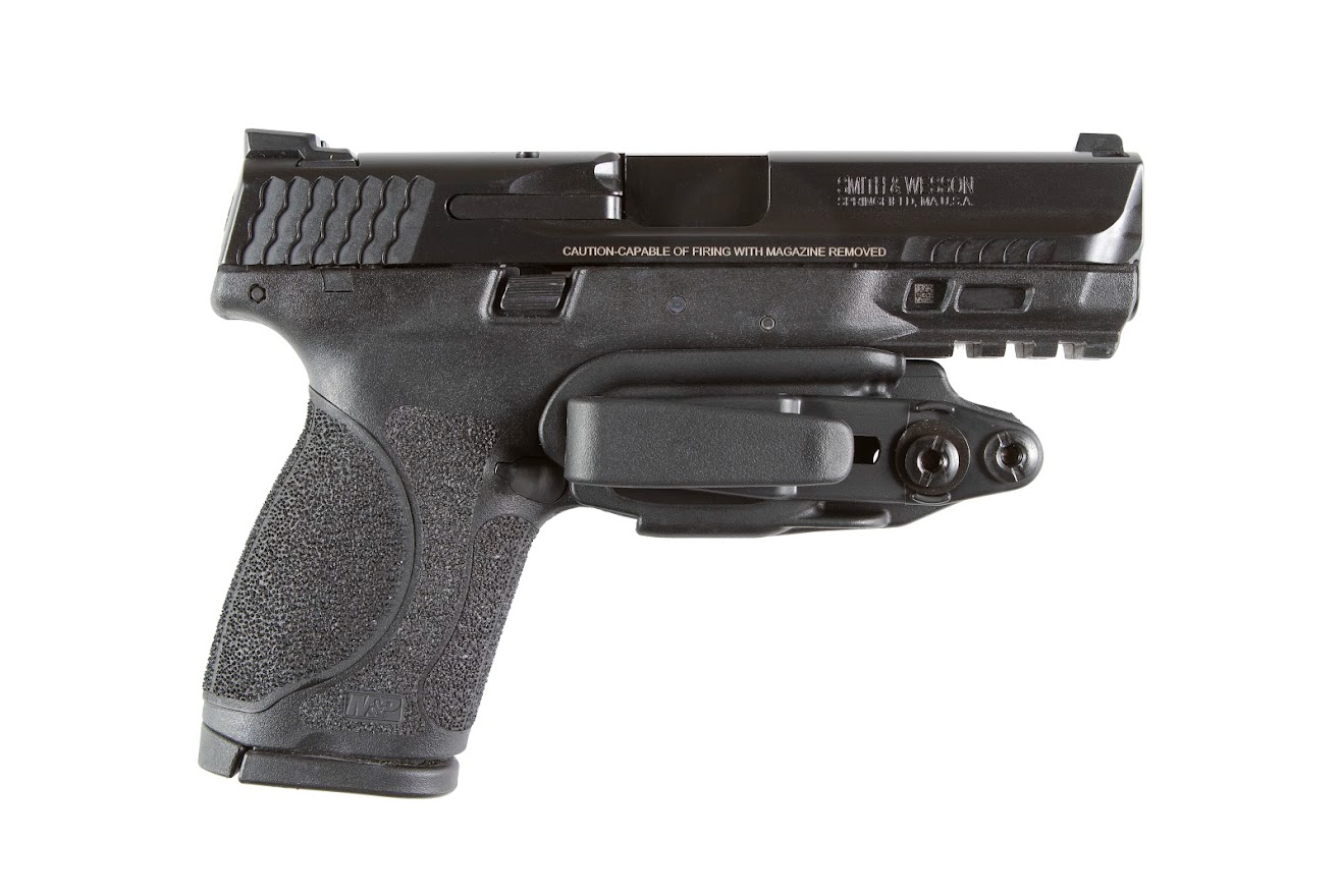 Black minimalist IWB holster with trigger guard coverage for secure firearm carry.