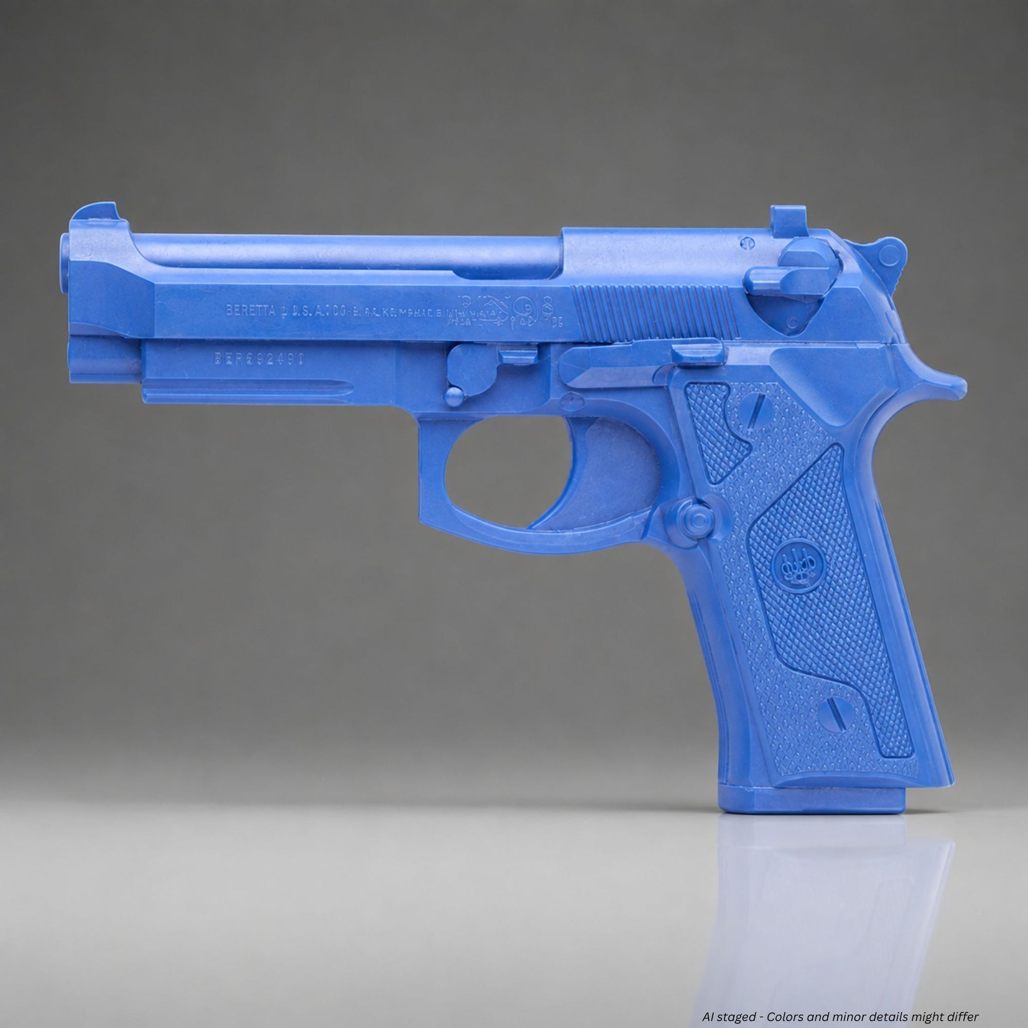 Blue Beretta 92 Vertec BlueGun replica, left side profile and grip detail