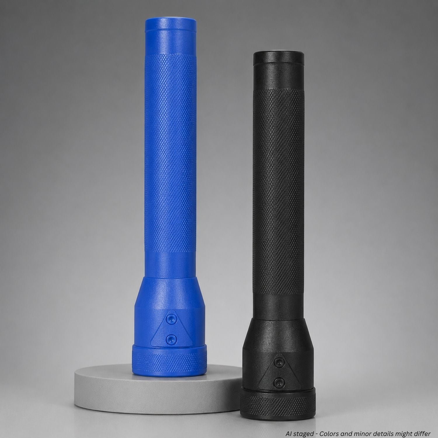 Blue and black police training flashlights on a gray background