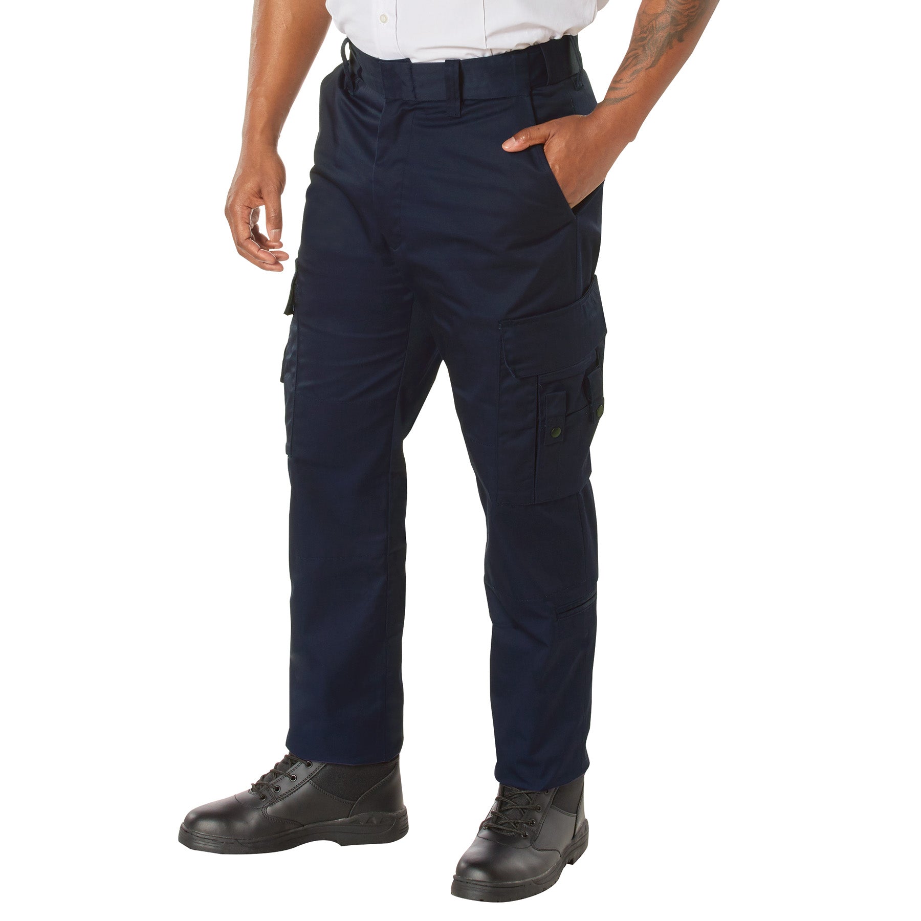 Person wearing navy cargo pants on a white background