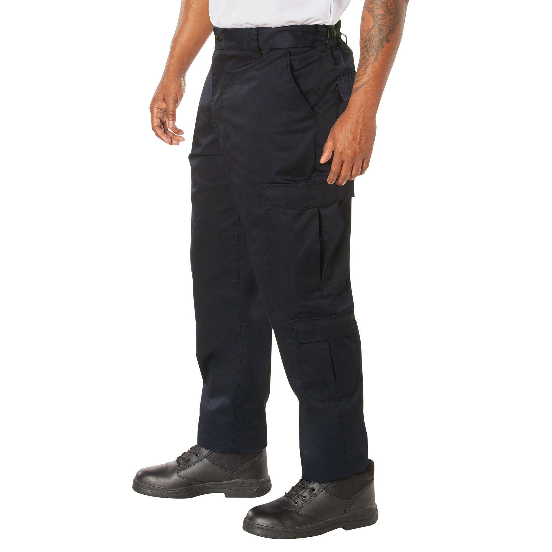 Person wearing Midnight Navy tactical pants on a white background
