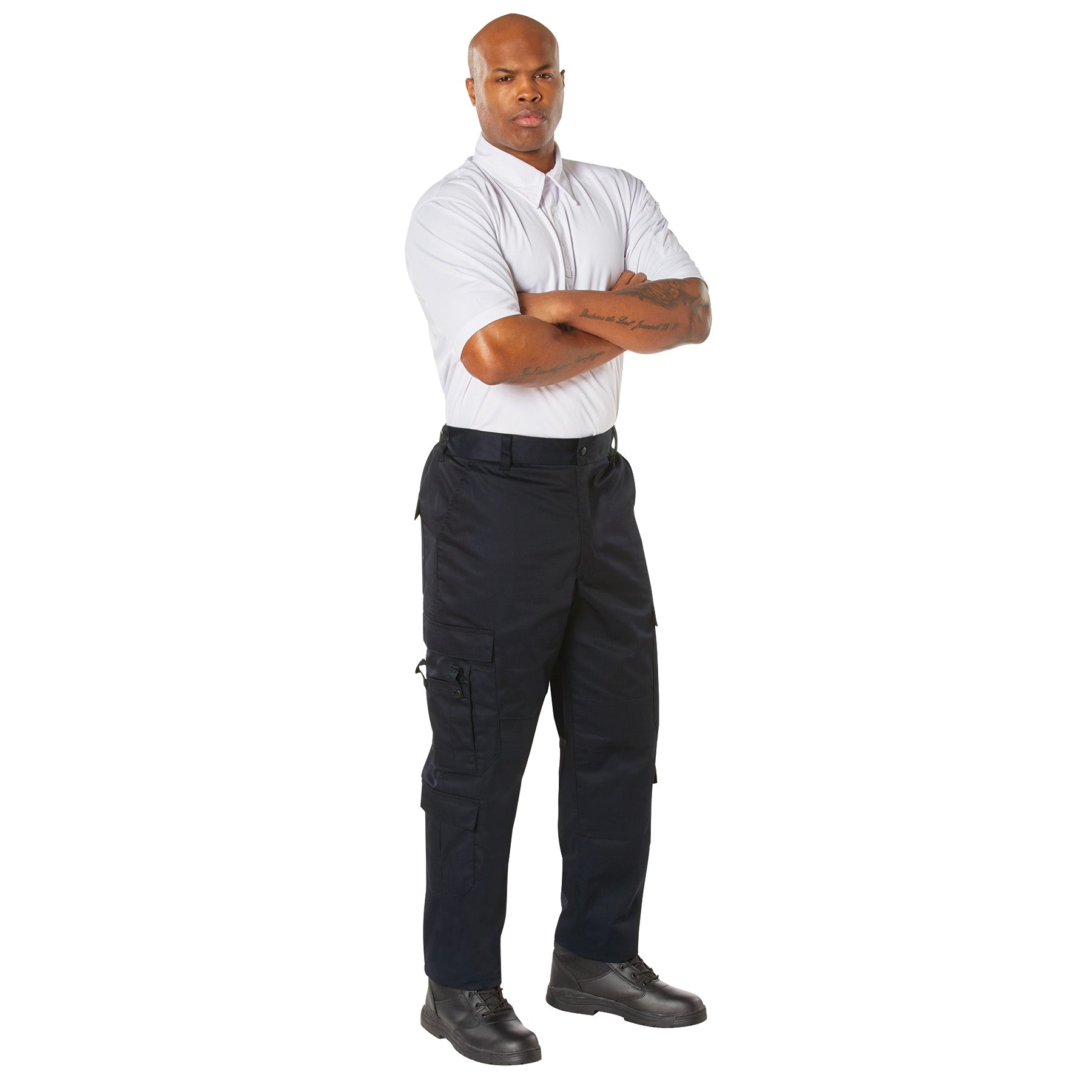 Man wearing a white shirt and Midnight Navy pants with cargo pockets on a white background
