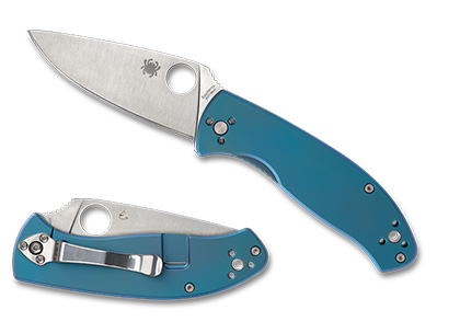 Spyderco Tenacious folding knife with titanium handle scales, featuring a stainless steel blade and secure Reeve Integral Lock mechanism.