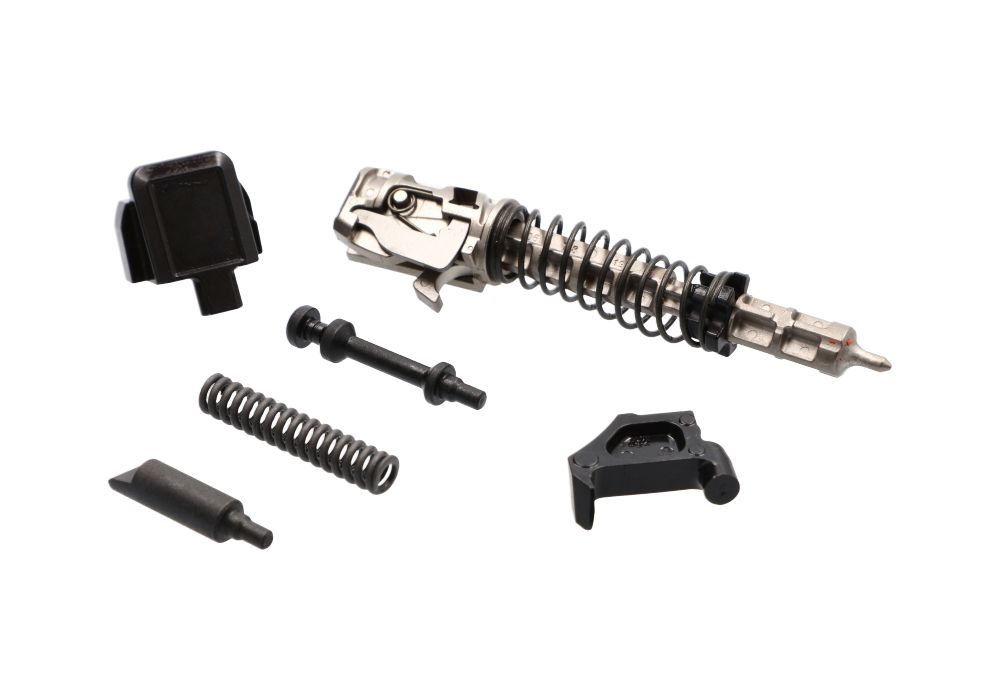 SIG SAUER P320 corrosion-resistant slide parts kit including extractor, striker group assembly, and springs.
