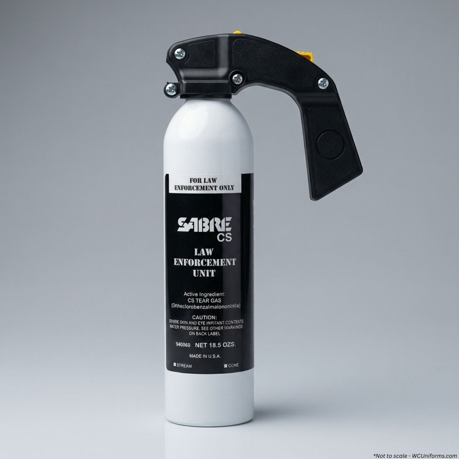 Sabre CS tear gas canister with black handle on a gray background