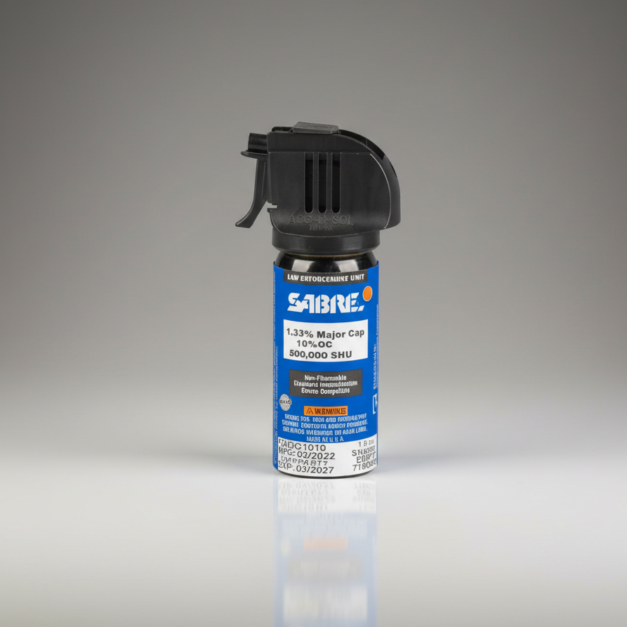 Sabre pepper spray canister on a gray background