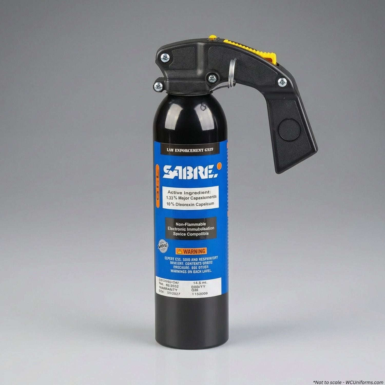 Sabre pepper spray canister with blue label on a gray background
