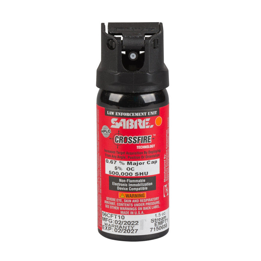 Pepper spray canister with red label on a white background